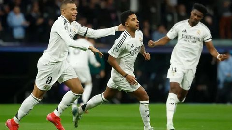 Bermain ketat dan sengit, Real Madrid sukses mengandaskan Atletico Madrid dengan skor 2-1. (Pierre-Philippe MARCOU/AFP)