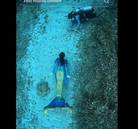 Pakai Kostum Duyung, Gubernur Sherly Tjoanda Unjuk Skill Menyelam dan Keindahan Pantai Maluku Utara. foto: TiiikTok @sherlytjoanda