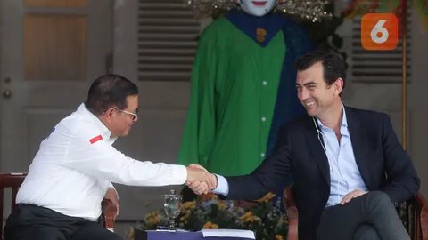 FOTO: Ekspresi Bos Formula E Saat Pramono Anung Nego Kontrak Kejuaraan Balap Mobil Listrik di Jakarta