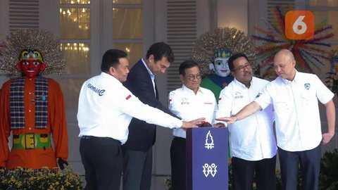 FOTO: Ekspresi Bos Formula E Saat Pramono Anung Nego Kontrak Kejuaraan Balap Mobil Listrik di Jakarta