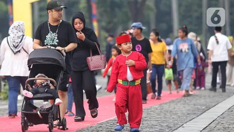 FOTO: Ribuan Warga Ramaikan Lebaran Betawi 2025