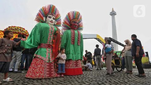 FOTO: Ribuan Warga Ramaikan Lebaran Betawi 2025