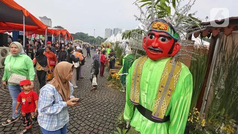 FOTO: Ribuan Warga Ramaikan Lebaran Betawi 2025