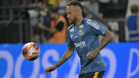 Neymar menyeka matanya saat konferensi pers pengenalan pemain baru Santos di Vila Belmiro, Sao Paulo, Brasil, Sabtu (01/02/2025) WIB. (AP Photo/Andre Penner)