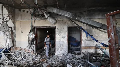 Militer Israel juga mengatakan bahwa serangan itu menargetkan Aslih dan menuduhnya beroperasi untuk Hamas dengan kedok sebagai wartawan. (Eyad BABA/AFP)