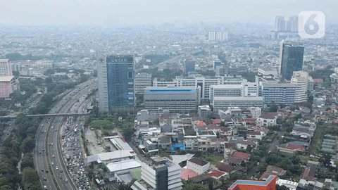 FOTO: Kualitas Udara di Jakarta Tidak Sehat untuk Kelompok Rentan dan Sensitif
