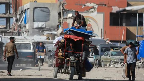 Blokade bantuan kemanusiaan oleh Israel memicu krisis kemanusiaan dan semakin meningkatkan risiko kelaparan massal yang menjadi sorotan berbagai lembaga internasional. (Bashar TALEB/AFP)