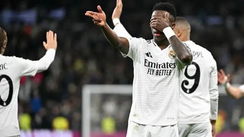 Selebrasi Vinicius Junior dalam laga Liga Champions antara Real Madrid vs Salzburg, Kamis (23/1/2025). (c) AP Photo/Manu Fernandez