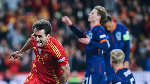 Pemain asal klub Barcelona itu turut cetak satu gol dalam laga yang dimenangkan Timnas Spanyol dengan skor 2-1 ini. (Tobias SCHWARZ / AFP)
