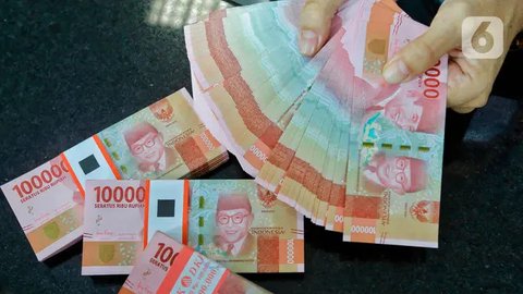 Nilai tukar rupiah terhadap dolar Amerika Serikat (AS) terus menguat, Jakarta, Kamis (23/10/2014) (Liputan6.com/Johan Tallo)