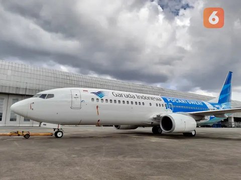 Pesawat Garuda terparkir di landasan pacu Terminal 3, Bandara Soekarno Hatta, Banten, Rabu (17/11/2021). Maskapai Garuda Indonesia akan menutup 97 rute penerbangannya secara bertahap hingg