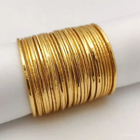 Model Gelang Emas Kadar 700 Paling Awet 2025. Foto: Gemini