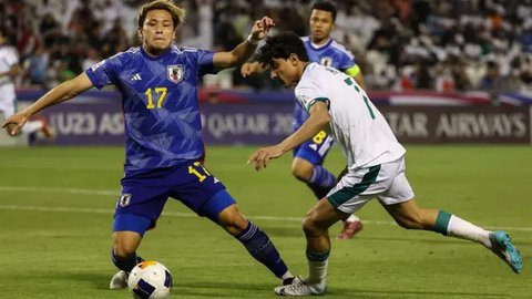 Pemain Timnas Irak, Ali Jassim. (KARIM JAAFAR / AFP)