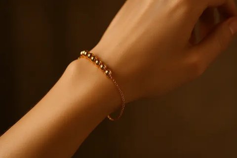 Model gelang emas elegan 2 gram (created by AI)