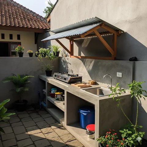 Inspirasi Dapur Outdoor Sederhana di Pekarangan Rumah Kecil Tren 2025. Foto: Gemini
