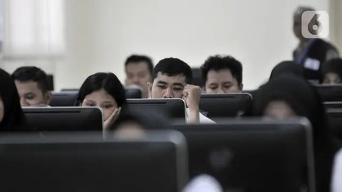 CPNS saat mengikuti SKD di Kantor BKN Pusat, Jakarta, Senin (27/1/2020). Tes SKD CPNS Tahun Anggaran 2019 diselenggarakan mulai 27 Januari hingga 28 Februari 2020 dengan jumlah peserta memenu