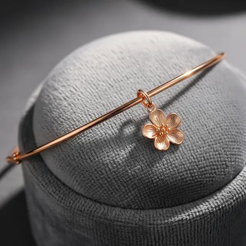 Model Gelang Bangle Tipis dengan Aksen Bunga/Gemini AI
