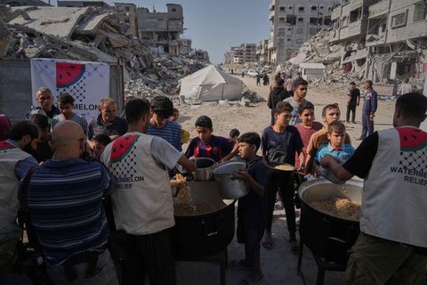 Foto udara ini menunjukkan bangunan-bangunan yang hancur di kawasan Al-Remal, Kota Gaza, pada 23 Oktober 2025. (Foto oleh AFP)