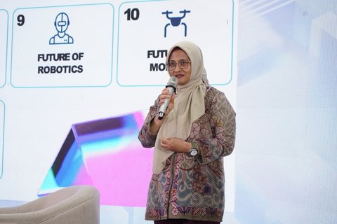 Direktur Utama Telkom Dian Siswarini saat memberikan pemaparan pada acara peluncuran Telkom AI Campus di Universitas Muhammadiyah Yogyakarta (UMY) pada Kamis (23/10).