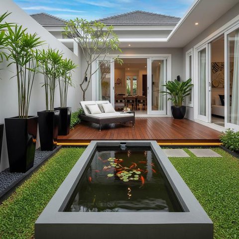 Halaman Belakang Rumah Kecil Tapi Mewah untuk Pelihara Ikan Mas Koki/Gemini AI