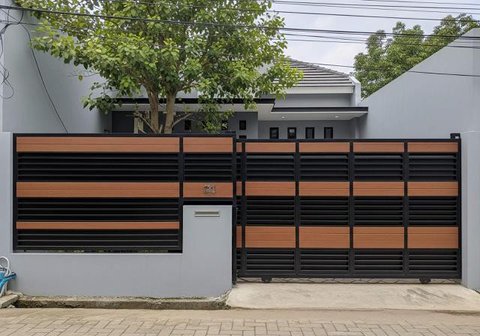 Desain Pagar Besi Hollow Rapat untuk Keamanan dan Privasi. Foto: Gemini