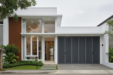 Model Rumah Mungil Tapi Punya Garasi Muat Mobil. Foto: Gemini
