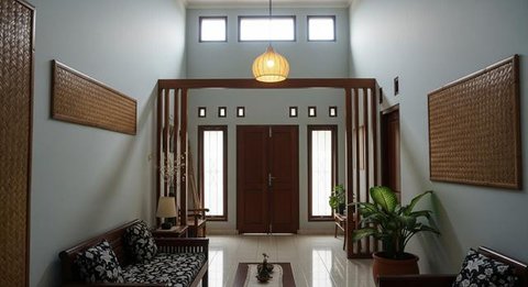 Desain Rumah Dalam Gang yang Terlihat Sempit dari Luar tapi Luas di Dalam/ Ilustrasi AI