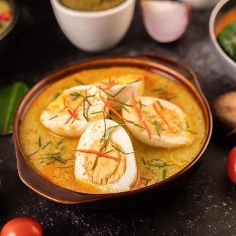 Ilustrasi Telur Bumbu Kuning Tanpa Santan
