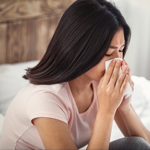 Ilustrasi seseorang mengidap flu.