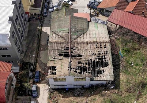 Klub malam yang terbakar di Kocani, Makedonia, Minggu (16/03/2025).<br />AFP/ Stringer
