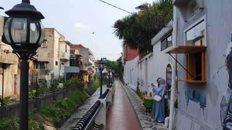 Kampung Wisata&nbsp;Heritage Malang telah dibuka lagi pasca pandemi Covid-19 tapi belum begitu banyak dipadati pengunjung (Liputan6.com/Zainul Arifin)