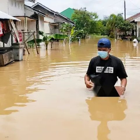 Ilustrasi banjir. (Liputan6.com/M Syukur)