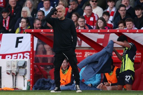 Manager Manchester City  Pep Guardiola di City Ground, Inggris, Sabtu (8/3/2025) malam WIB.