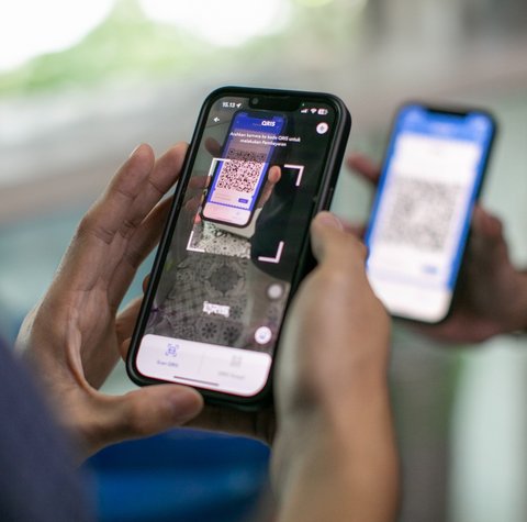 Ilustrasi transaksi pembayaran menggunakan fitur QRIS Transfer. (Foto: Istimewa)