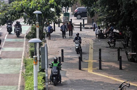 FOTO: Trotoar Yang Berubah Fungsi di Ibukota Jakarta