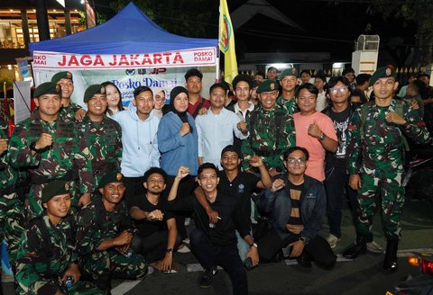 Prajurit TNI Kodam Jaya TNI AD saat melakukan patroli di Kota Jakarta, Rabu (03/09/2025).