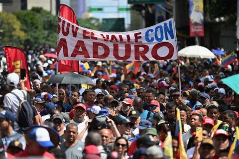 Presiden Venezuela Nicolas Maduro dan istrinya Cilia Flores (AFP Photo/Federico Parra)