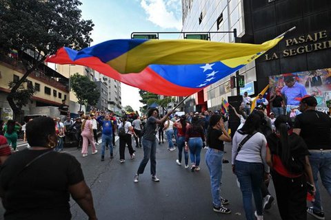 Presiden Venezuela Nicolas Maduro dan istrinya Cilia Flores (AFP Photo/Federico Parra)