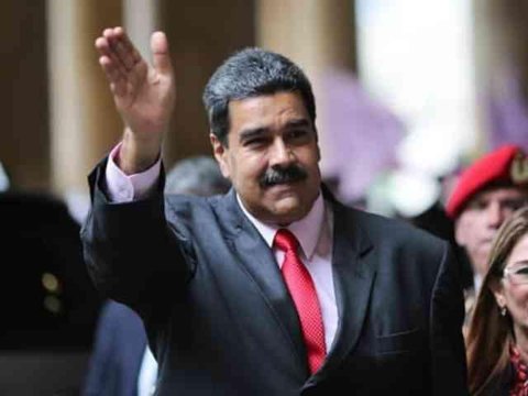 Presiden Venezuela Nicolas Maduro dan istrinya Cilia Flores (AFP Photo/Federico Parra)