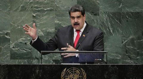 Presiden Venezuela Nicolas Maduro dan istrinya Cilia Flores (AFP Photo/Federico Parra)