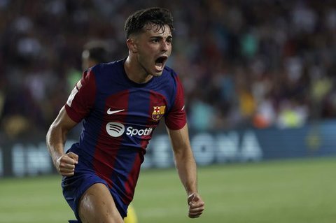 Pedri menyumbang satu gol dalam duel Supercopa de Espana antara Barcelona versus Real Madrid di Supercopa de Espana Di King Fahd Stadium, Arab Saudi, Senin (16/1/2023) WIB. (AP/Hussei