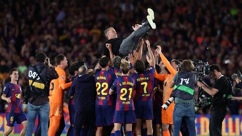 Penyerang Barcelona, Marcus Rashford, berselebrasi setelah mencetak gol ke gawang Olympiakos pada pada laga Liga Champions di Estadi Olimpic Lluis Companys, Rabu (22/10/2025) dini hari WIB. (