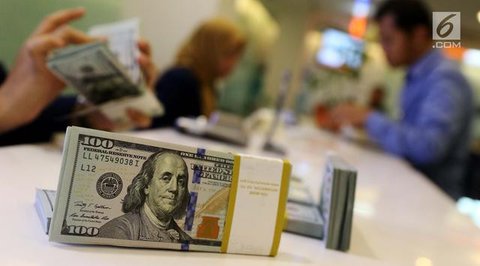 Ilustrasi Uang Dollar Credit: pexels.com/cottonbro