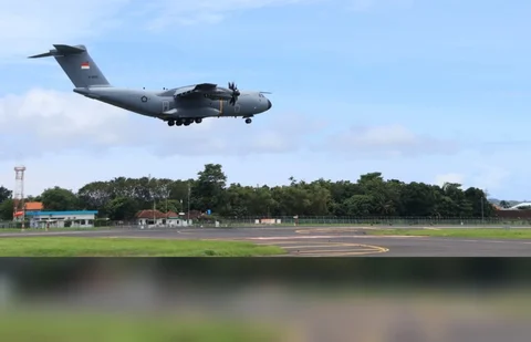 Pesawat Airbus A400M Atlas TNI AU melaksanakan uji fungsi sistem pendaratan berbasis Instrument Landing System dengan manuver low approach di Lanud I Gusti Ngurah Rai, Bali, Jumat (27/02/2026)