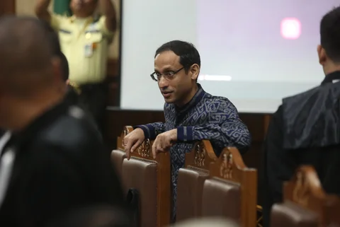 Terdakwa kasus dugaan korupsi pengadaan Chromebook dalam program digitalisasi pendidikan di Kemendikbudristek Nadiem Makarim saat menghadiri  sidang lanjutan di Pengadilan Tipikor, Jakarta, Senin (20/04/2026).