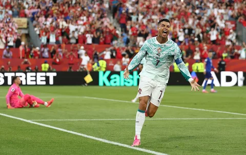 Penyerang Portugal Cristiano Ronaldo merayakan setelah mencetak gol pertama timnya dari titik penalti selama pertandingan sepak bola babak 32 besar Piala Dunia 2026 antara Portugal dan Kroasia di Stadion Toronto, Toronto, Kamis (02/07/2026).
