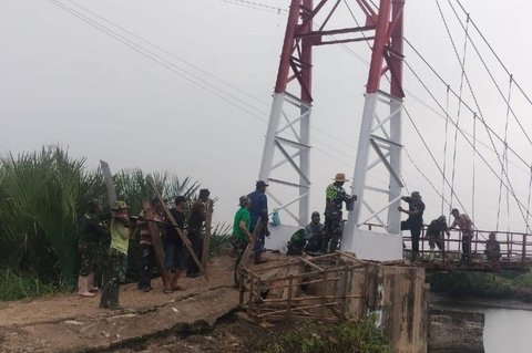 TNI Selesaikan Pembangunan Jembatan Gantung Langkat, Mobilitas Warga Gebang Makin Lancar