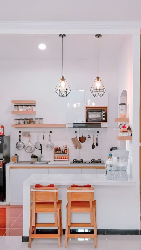 Arrangement of a Charming Kitchen with a Bar Table, Clean and Minimalist