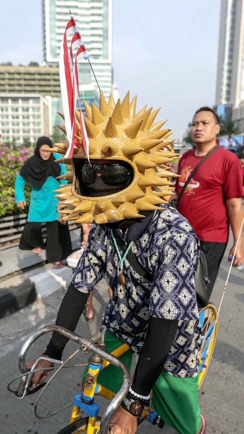 FOTO: Suasana Car Free Day di Kawasan Bundaran HI Jakarta dengan Keadaan Polusi Udara Terburuk di Dunia