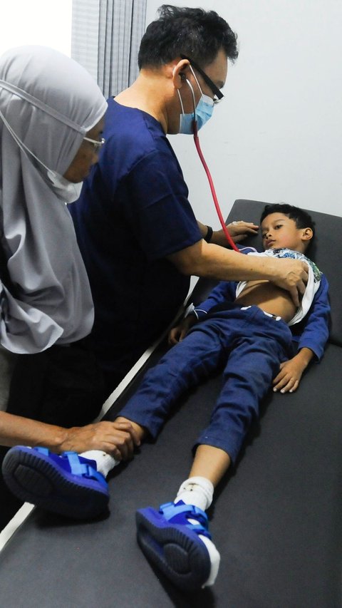 FOTO: Penderita ISPA Meningkat di Tengah Buruknya Polusi Udara Jakarta